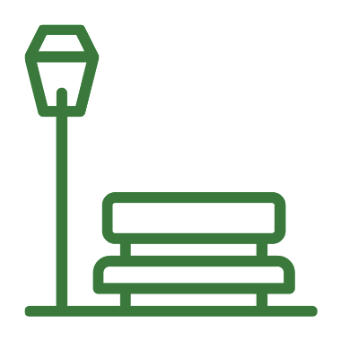 Icoon 'je buurt' - Bankje en straatlantaarn. De link gaat naar de themapagina over je buurt.